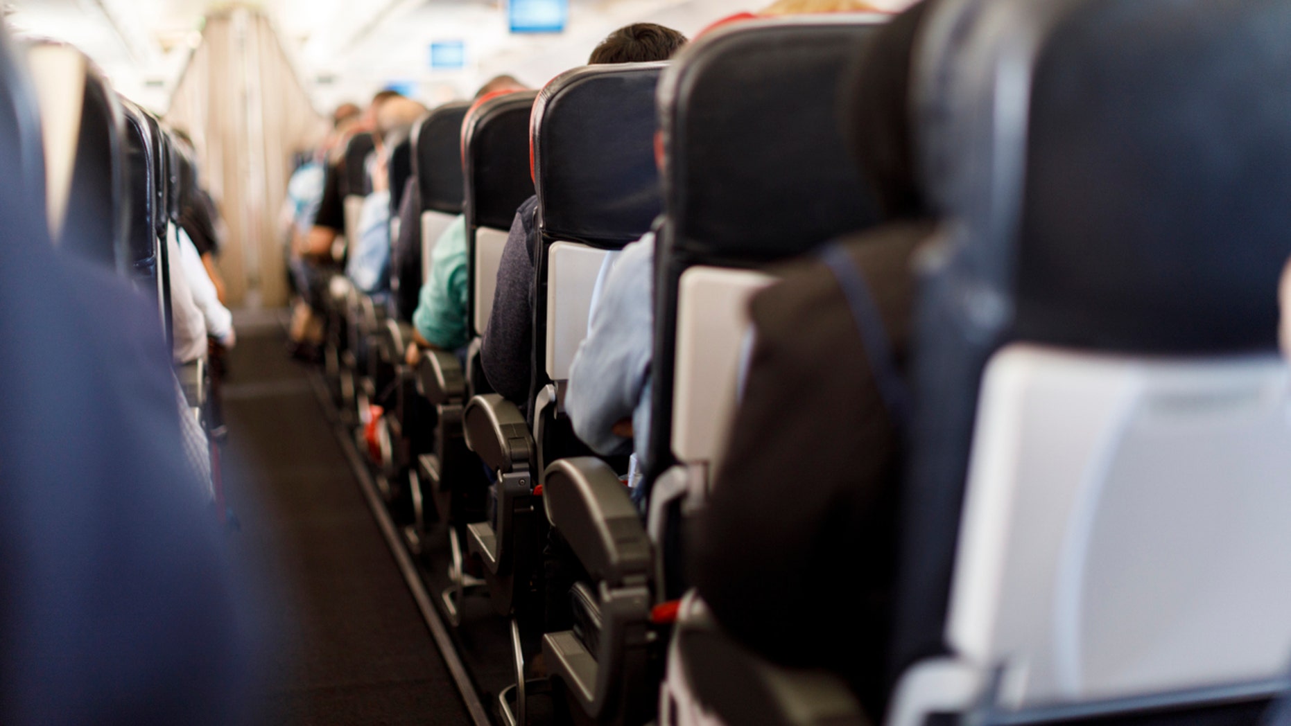 The view down the aisle of a flight