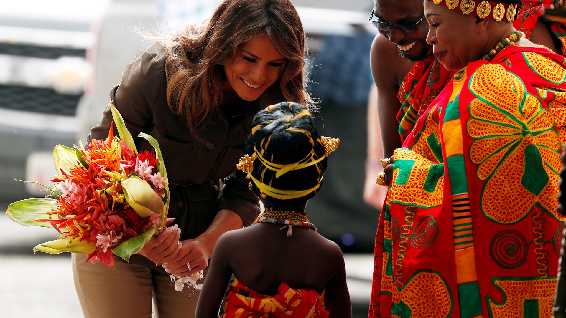 U.S. first lady Melania Trump greets a child during her visit at Cape Coast Castle, Ghana, October 3, 2018. REUTERS/Carlo Allegri