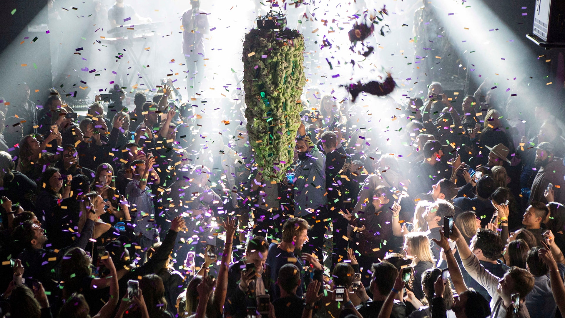 A depiction of a cannabis bud drops from the ceiling at a countdown party marking the first day of the legalization of cannabis across Canada in Toronto, Oct. 17, 2018.