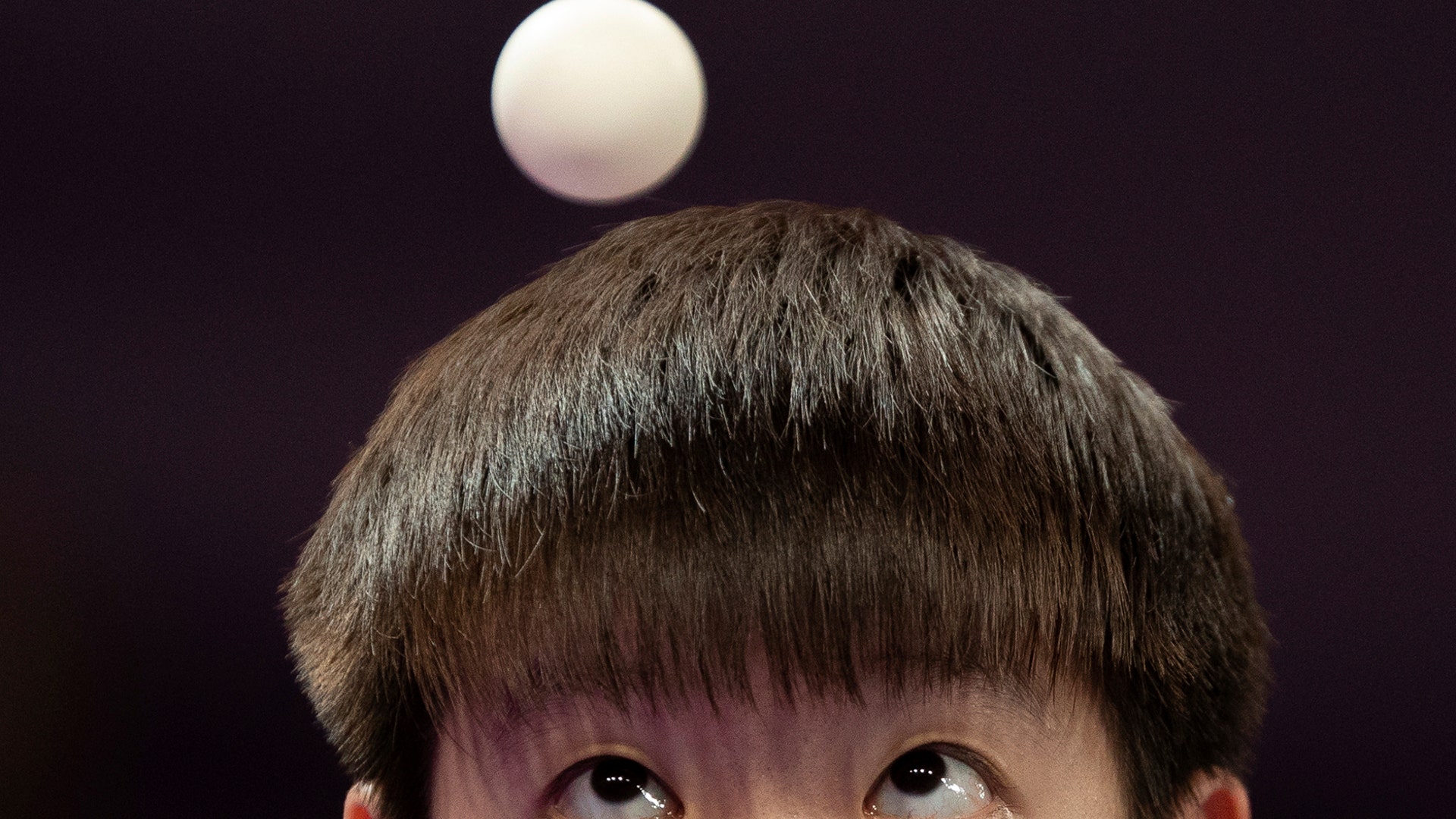 China's Yingsha Sun watches the ball during the Table Tennis International Team Event Gold Medal match against Japan at the Youth Olympic Games in Buenos Aires, Argentina, Oct. 15, 2018. 