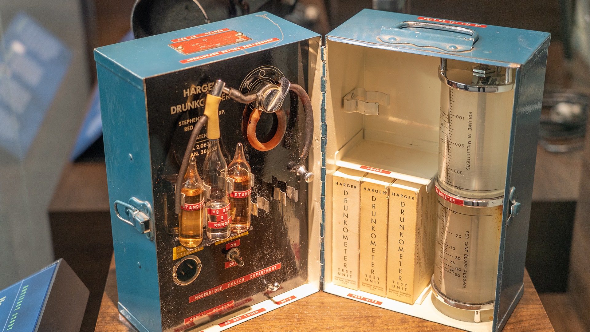 An early model of the breathalyzer, called a "Drunkometer," sits alongside other historical items from police departments across the country.