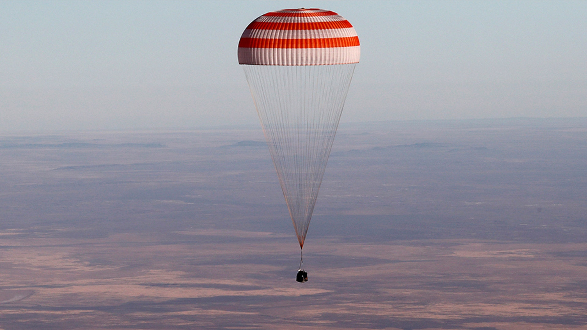 A Russian Soyuz MS-08 space capsule lands south-east of Dzhezkazgan, Kazakhstan, Oct. 4, 2018.