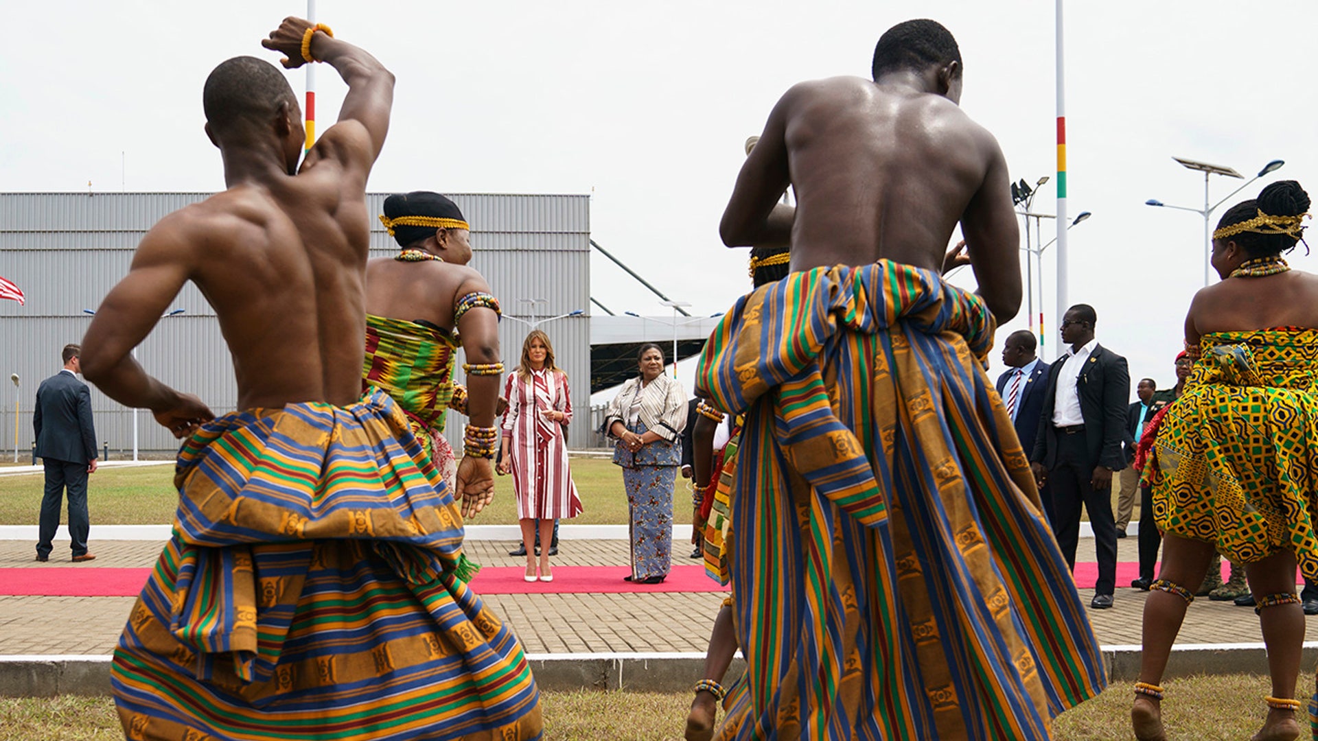 First lady Melania Trump and Ghana's first lady Rebecca Akufo-Addo watch dancers during an arrival ceremony at Kotoka International Airport in Accra, Ghana, Tuesday, Oct. 2, 2018. (AP Photo/Carolyn Kaster)
