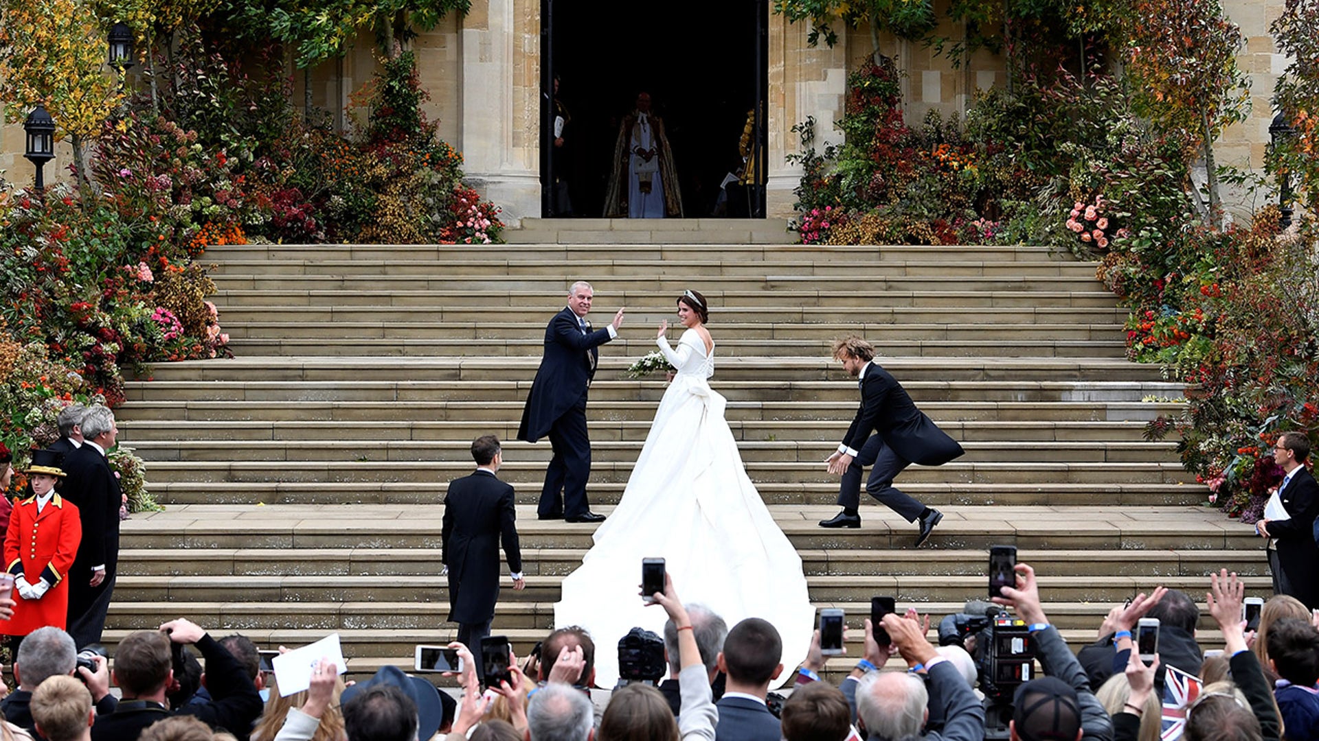 Princess Eugenie and her father Prince Andrew, Duke of York, arrive at St George's Chapel for her wedding to Jack Brooksbank in Windsor, Britain October 12, 2018. REUTERS/Toby Melville - RC157B358970