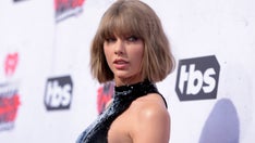 Taylor Swift announces she's re-recorded 'Fearless' album with new version of 'Love Story' coming at midnight