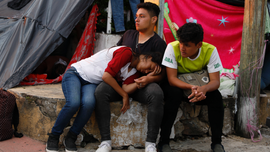 The Latest: Migrant caravan has 60-mile goal for Friday