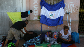 In migrant caravan, a Nicaraguan family flees persecution