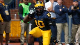 University of Michigan football star spotted damaging Michigan State’s logo