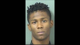Florida teenager pulled gun on praying high school football team, police say