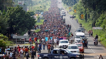 Pictures: Migrant caravan pushes toward the United States