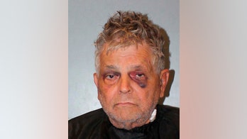 Nearly 130 guns found in home of police ambush suspect, officials say