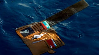 Indonesia plane crash search finds remains, debris at sea