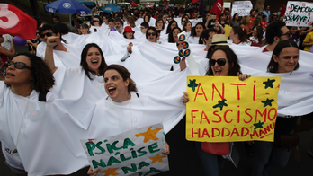 Polarizing presidential race divides families across Brazil