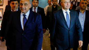 Iraq's president takes office, independent tapped as PM