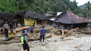 Floods, landslides in Indonesia leave 22 dead, 15 missing