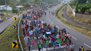 The Latest: Federal police monitoring migrant caravan