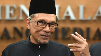 Malaysian PM-in-waiting Anwar takes oath as lawmaker