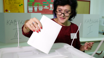 Bosnians vote in divisive election testing potential EU bid