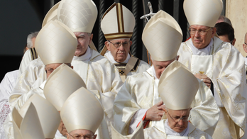 The Latest: Pope declares Oscar Romero, Pope Paul VI saints