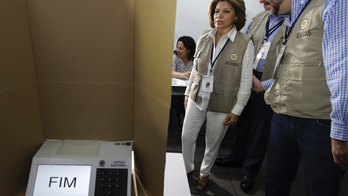 The Latest: Voting peace in Brazil presidential election