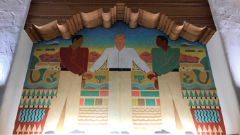 University head recommends covering controversial murals