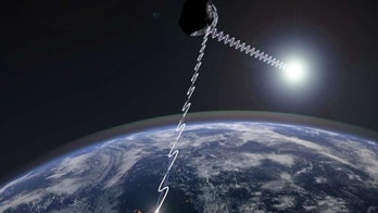 Astronomers zero in on blue-hued asteroid