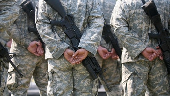 AWOL Army soldier tried to bring gun on flight, claimed to be law enforcement officer, prosecutors say