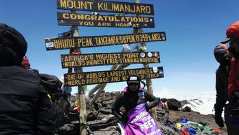 Mom who lost hands, feet to sepsis climbs Kilimanjaro