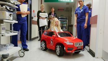 Hospital lets kids 'drive' to surgery with motorized car
