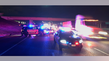 Search on for road rage gunman who fled after shooting driver while family watched, police say