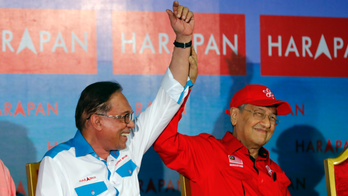 Voting opens in Malaysia by-election for PM-in-waiting Anwar