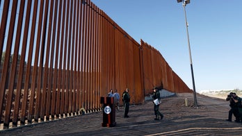 Section of Trump's border wall unveiled in California as caravan advances north through Mexico
