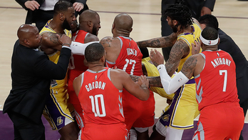 Fight in LeBron's home Los Angeles Lakers debut, 124-115 loss to Houston Rockets