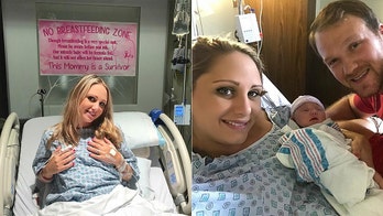 Breast cancer survivor hangs 'no breastfeeding zone' banner after giving birth