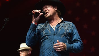 Tracy Byrd's keyboard player hospitalized after lighting rig crashes during performance
