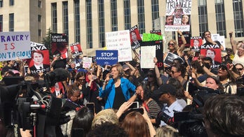 Kavanaugh protesters arrested at Capitol, after thousands march on Supreme Court