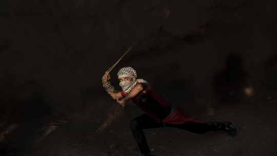 The Latest: Mourners hold funerals for 7 killed in Gaza