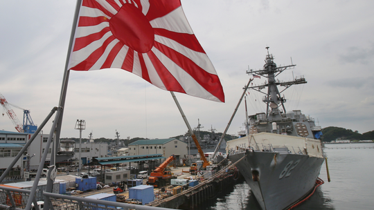 Japan to skip South Korea fleet event over 'rising sun' flag