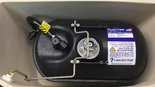 Toilet-flusher manufacturer recalls 1.4 million units following reports of bursting units, injured customers