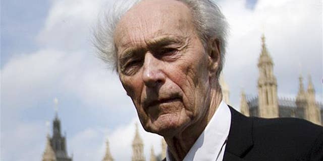 In this April 25, 2013, file photo, Norwegian war hero and resistance fighter Joachim Roenneberg walks in a park near the Palace of Westminster in London.
