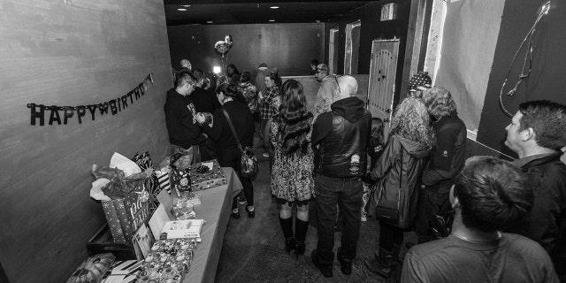 Nearly 100 locals came bearing gifts and goodies for the boy's party.