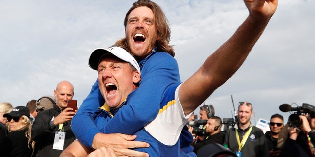 Team Europe's Ian Poulter celebrates with Tommy Fleetwood after winning the 2018 Ryder Cup (REUTERS/Paul Childs)