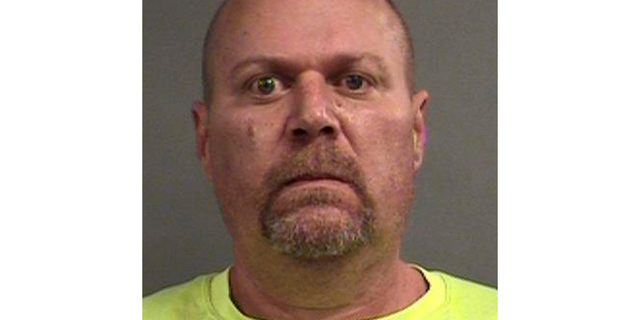 This photo provided by Louisville Metro Department of Corrections shows Gregory Alan Bush, who was booked early Thursday, Oct. 25, 2018, on two counts of murder and 10 counts of felony wanton endangerment, according to Louisville Metro Detention Center records. (Louisville Metro Department of Corrections via AP)
