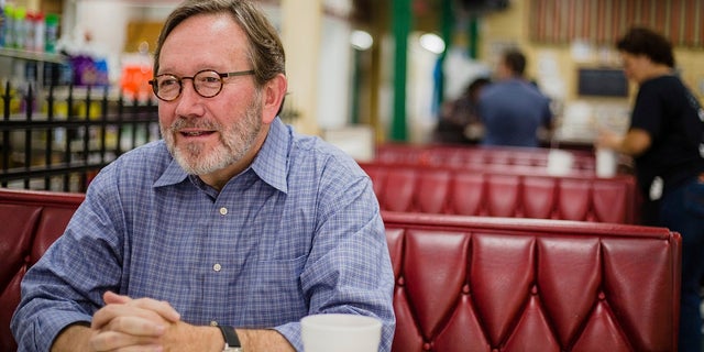 FILE - Archie Parnell, South Carolina's 5th Congressional district Democratic nominee, talks with a reporter in downtown Sumter, S.C.