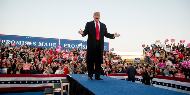 President Donald Trump arrives for a rally at Southern Illinois Airport in Murphysboro, Ill., Saturday, Oct. 27, 2018. (AP Photo/Andrew Harnik)