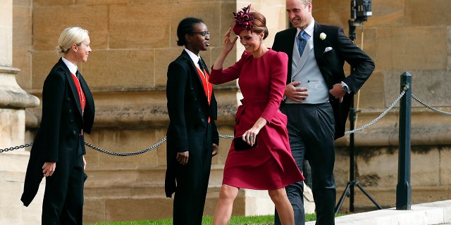 Britain's Prince William and Kate, Duchess of Cambridge arrive to attend the wedding of Princess Eugenie of York and Jack Brooksbank at St George’s Chapel, Windsor Castle, near London, England, Friday Oct. 12, 2018. (Adrian Dennis/Pool via AP)