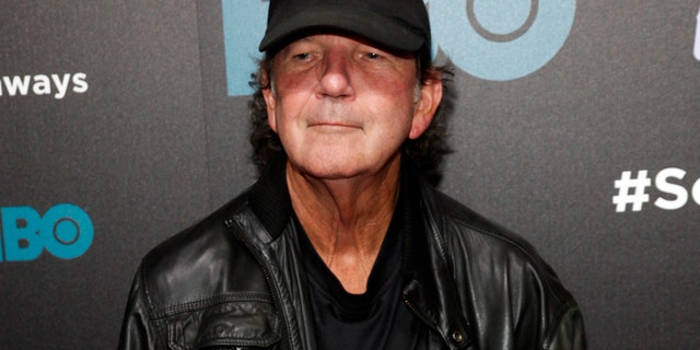 FILE - In this Oct. 14, 2014 file photo, Tony Joe White attends the premiere of HBO's "Foo Fighters Sonic Highway" in New York. White, who had a hit in 1969 with “Polk Salad Annie” and whose songs were covered by music greats like Elvis Presley, Hank Williams Jr., Tina Turner, Ray Charles and Waylon Jennings, died Wednesday, Oct. 24, 2018. He was 75.