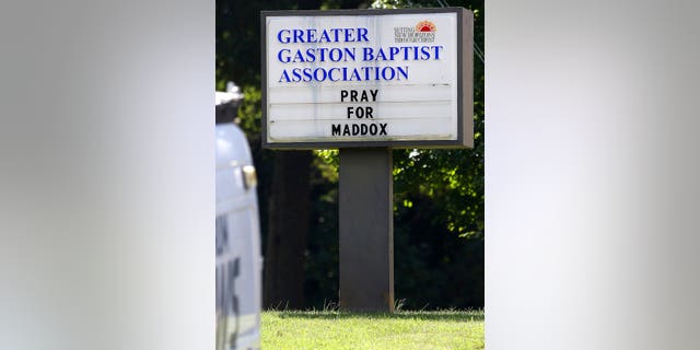 The message on the sign in front of the Greater Gaston Baptist Association office is shown Wednesday, Sept. 26, 2018, in Gastonia, N.C., near Rankin Lake Park where 6-year-old Maddox Ritch disappeared while visiting the park with his father Saturday, Sept. 22, 2018. (AP Photo/John Clark Gaston Gazette)