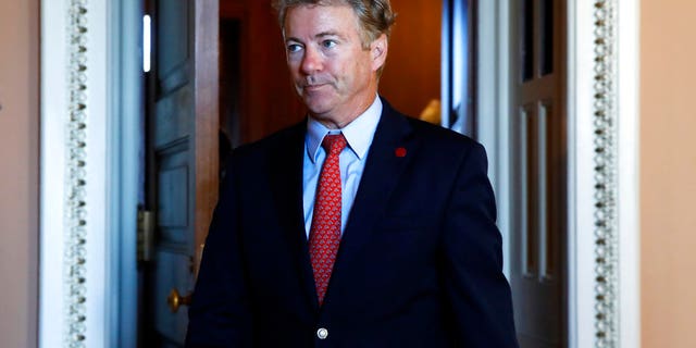 Sen. Rand Paul, R-Ky., leaves a meeting of Senate Republicans with Vice President Mike Pence, Wednesday, Sept. 26, 2018, on Capitol Hill in Washington. Paul has often clashed with Anthony Fauci in congressional hearings. (AP Photo/Jacquelyn Martin)