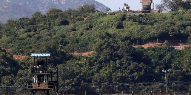 Seoul says South Korea has begun clearing mines from two sites inside the heavily fortified border with North Korea under a package of tension-reduction deal between the rivals. (Kim Do-hoon/Yonhap via AP)